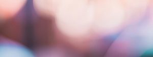 Out-of-focus background with pink tones
